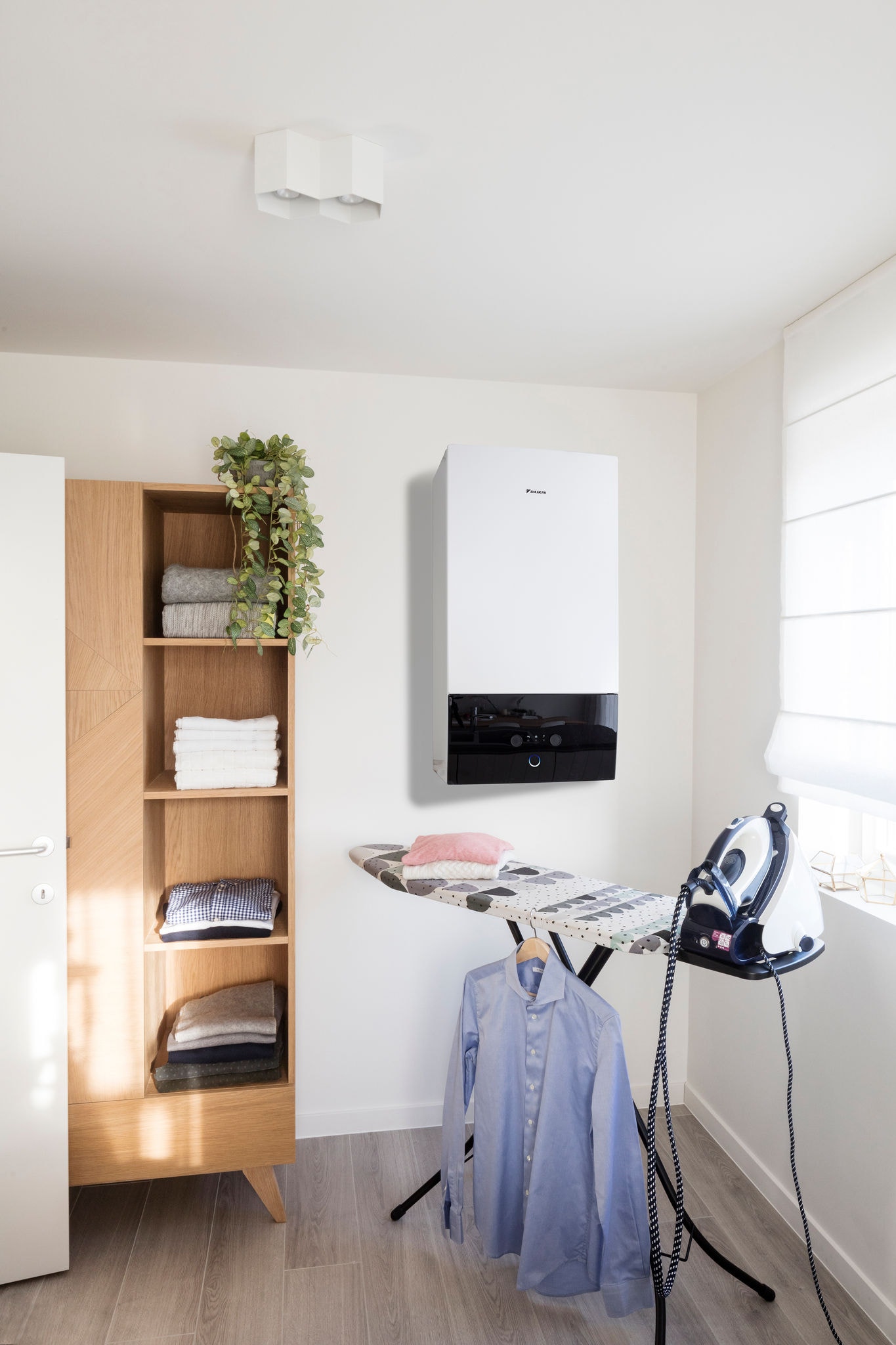 Daikin Altherma indoor unit connected with solar panels installed in laundry room
